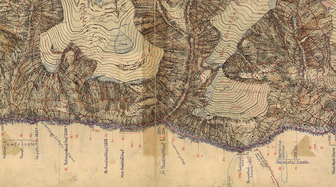 Auf der handgezeichneten topographischen Karte aus dem Jahr 1891 ist ein Ausschnitt des Wettersteingebirges zu sehen. Die Erdoberfläche ist durch rote Höhenlinien und schwarze Felsschraffen dargestellt. Ergänzt durch blaue und rote Beschriftung der Objekte. 